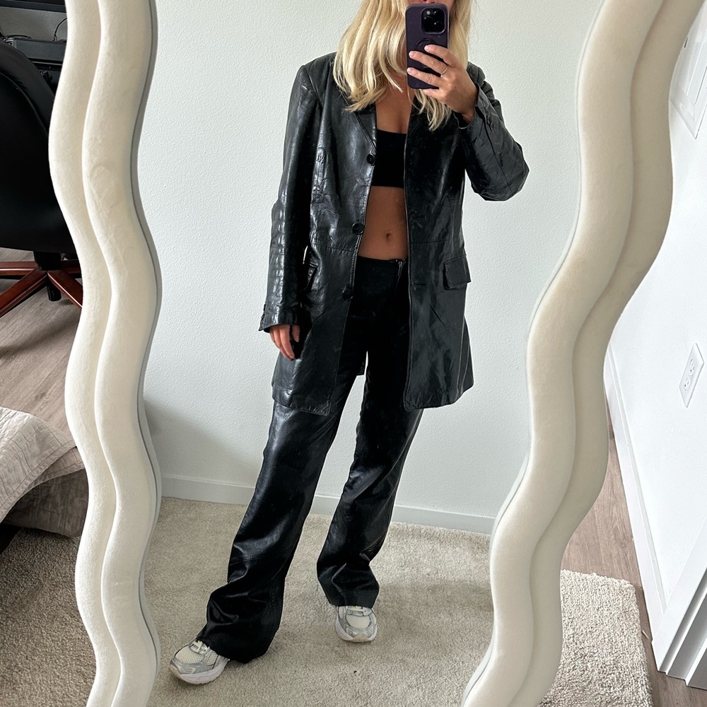 Longer vintage black leather coat size S from Notabene.